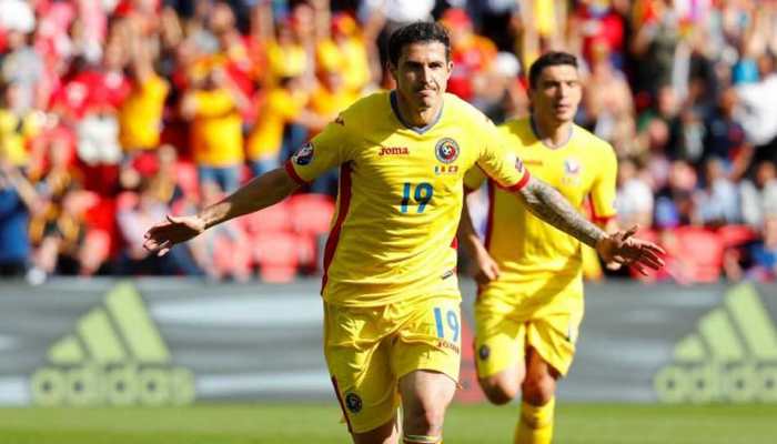 Romania outclass Lithuania to keep alive promotion hopes