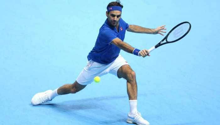 Federer must wait for 100th title, but happy with season