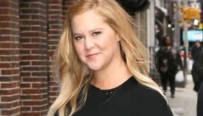 Amy Schumer returns to work after hospitalization