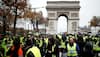 French police fire tear gas at protesters on Champs Elysees