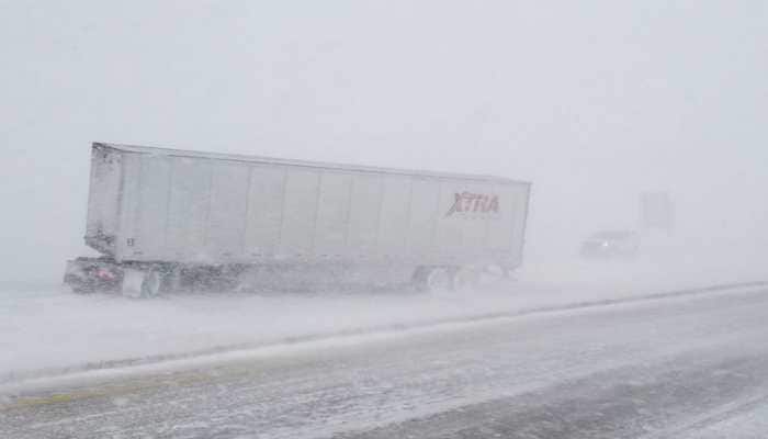 Going to the US? Check flight status as blizzard wrecks holiday plans