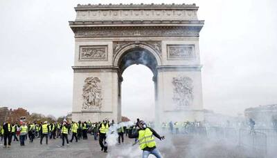 France mulls state of emergency after Paris riots, won't change policy