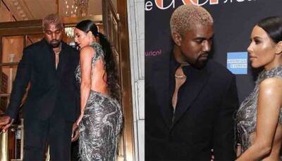 Kim Kardashian suffers wardrobe malfunction in shredded silver gown