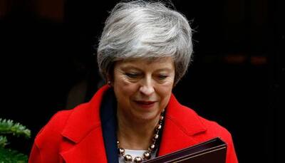 Before Brexit debate, Britain PM Theresa May suffers damaging blow