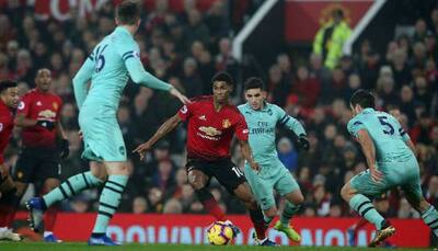 EPL: Manchester United battle to draw with Arsenal, Liverpool march on