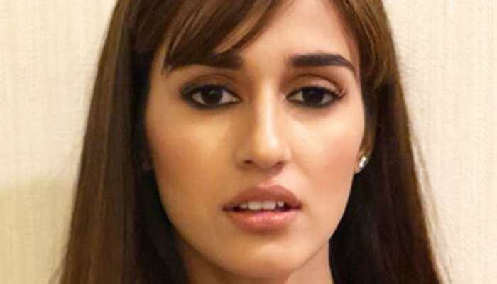 Disha Patani flaunts her washboard abs, poses in black lingerie—Pic