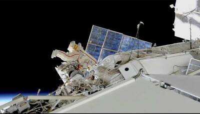 Russian cosmonauts undertake spacewalk to solve mystery of small hole in craft