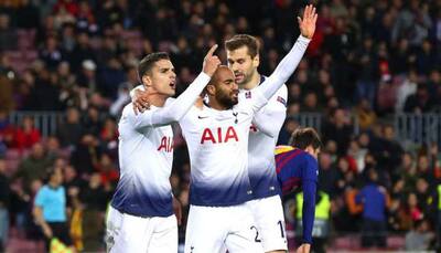 UEFA Champions League: Spurs reach last 16 as Moura snatches draw at Barca