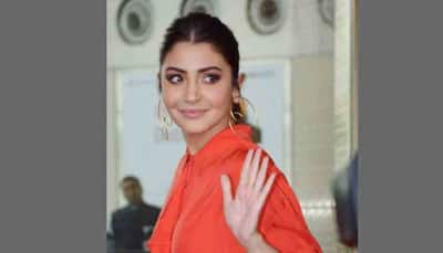Anushka Sharma nails her airport look in this orange outfit like a pro — Pics inside