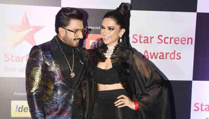 Deepika Padukone, Ranveer Singh walk hand-in-hand at red carpet in colour-coordinated outfits