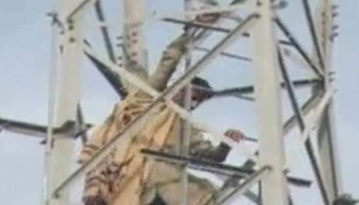 Man climbs mobile tower in Pakistan demanding PM post, claims will improve economy
