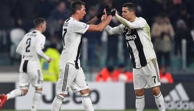 Juventus beat Roma to stay undefeated in Serie A