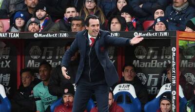 Arsenal manager Unai Emery charged for kicking bottle at fan