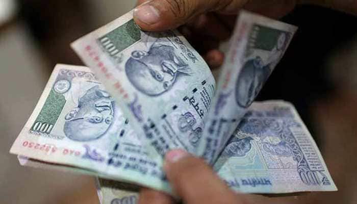 Rupee recovers 34 paise to 69.86 against US dollar in morning trade