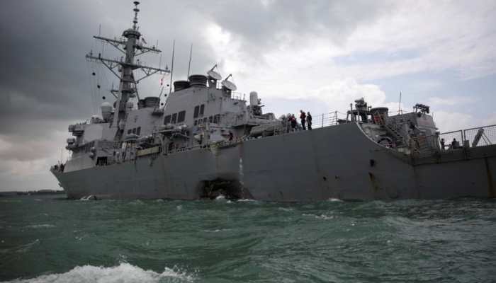 US navy ship sails in disputed South China Sea amid trade talks with Beijing