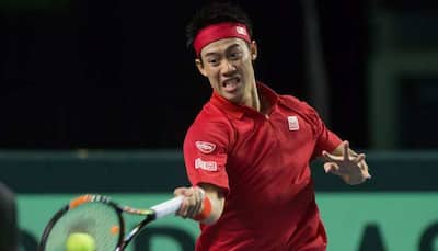 Australian Open: Kei Nishikori reaches second round after Kamil Majchrzak retires