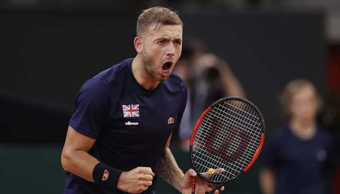 Australian Open: Dan Evans shoulders slim British hopes against Roger Federer