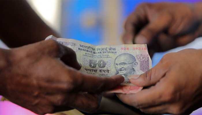 Rupee logs 1st gain in five sessions, rises 21 paise against dollar