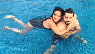 Monalisa sizzles in a black swimsuit, enjoys pool time with hubby Vikrant Singh – See pics