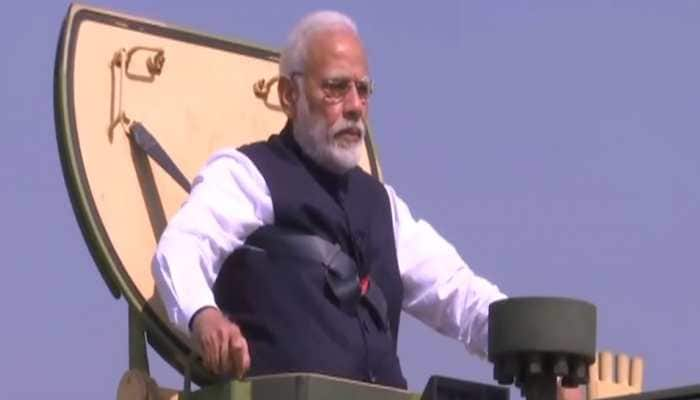 Watch: PM Modi inaugurates L&amp;T&#039;s howitzer gun-manufacturing unit, rides a K9 Vajra