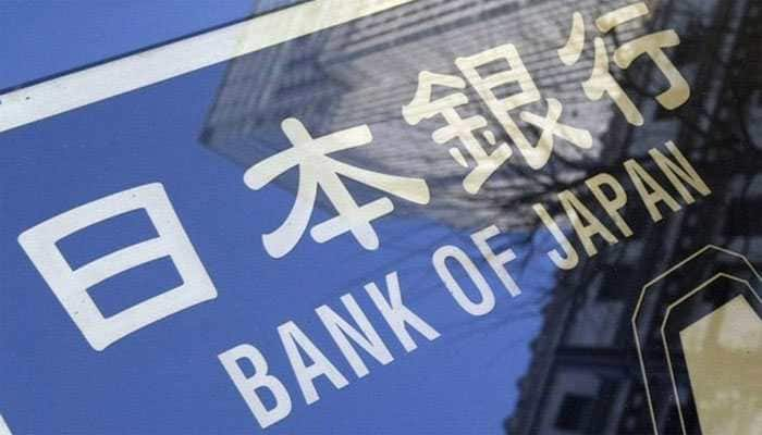 BOJ keeps policy steady, cuts inflation forecast