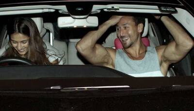 Disha Patani is all smiles with rumoured beau Tiger Shroff as they head for a drive—Pics