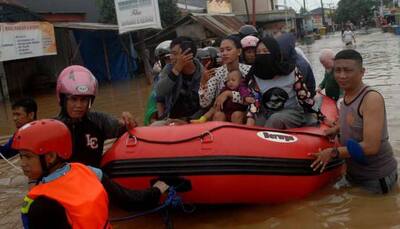 Death toll in Indonesia floods reaches 59