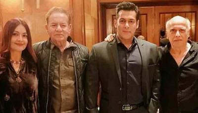 Salman Khan strikes a pose with his father Salim Khan at Mukesh Bhatt's daughter wedding reception