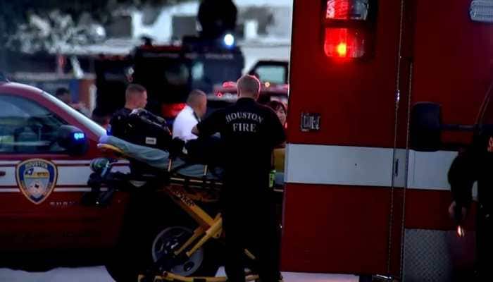Four police shot and two suspects killed in Houston gunfight-police