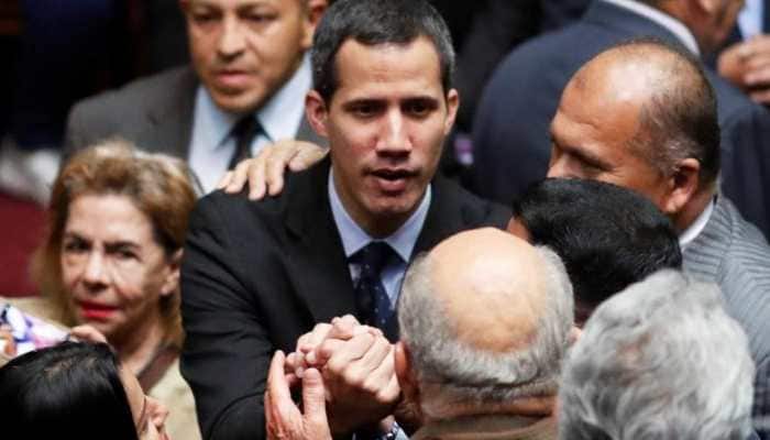 Venezuela targets Juan Guaido with probe, travel ban, asset freeze
