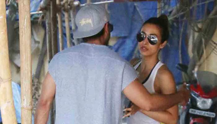Shahid Kapoor bumps into Malaika Arora at his gym and they greet with a warm hug