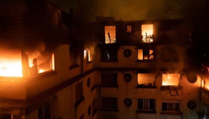 Blaze kills 10 in Paris apartment block, arson suspected