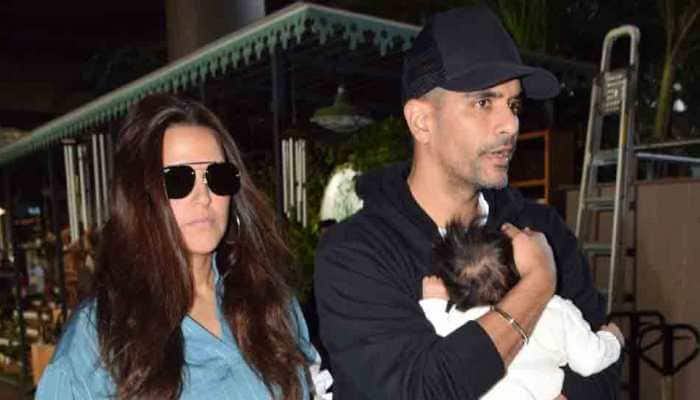 Neha Dhupia, Angad Bedi spotted at airport with daughter Mehr — Pics