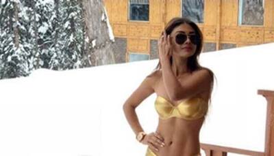 Sreejita De takes up minus 10-degree challenge, flaunts her washboard abs in metallic gold bikini - Pics