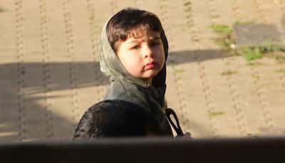 Taimur Ali Khan looks cute as a button wearing this military green hoodie—See pics