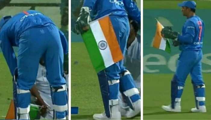 MS Dhoni prevents Indian flag from touching the ground as fan bows down, leaves Twitterati in awe - In pics