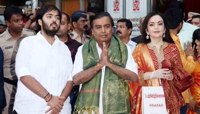 Akash Ambani-Shloka Mehta wedding: Mukesh Ambani, wife Neeta visit Siddhivinayak temple, offer wedding card