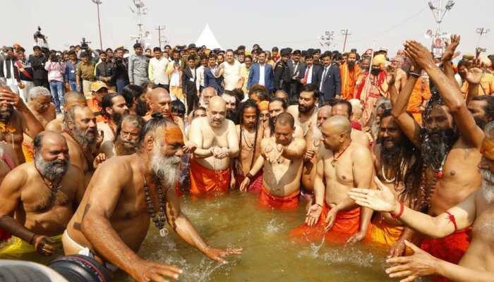 Amit Shah, Yogi Adityanath take holy dip at Kumbh Mela in Prayagraj - Watch