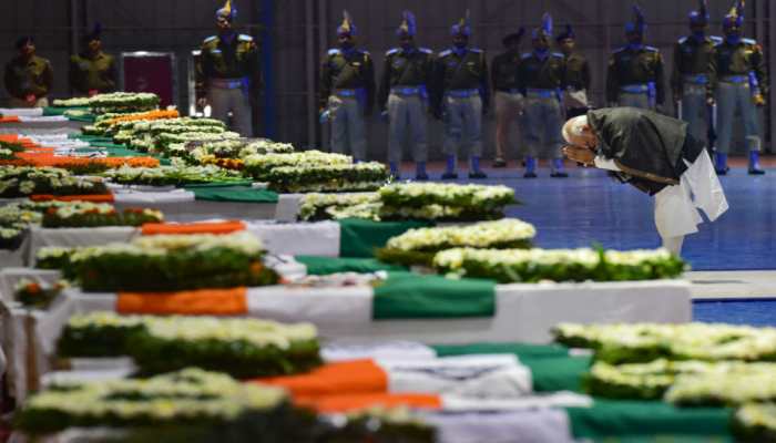 PM Narendra Modi pays last respects to martyred CRPF personnel