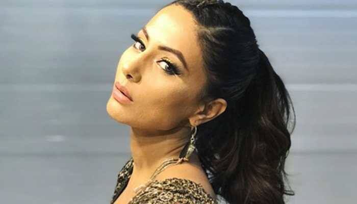 Hina Khan flaunts her toned body in an electric blue crop top and skirt—See Pics