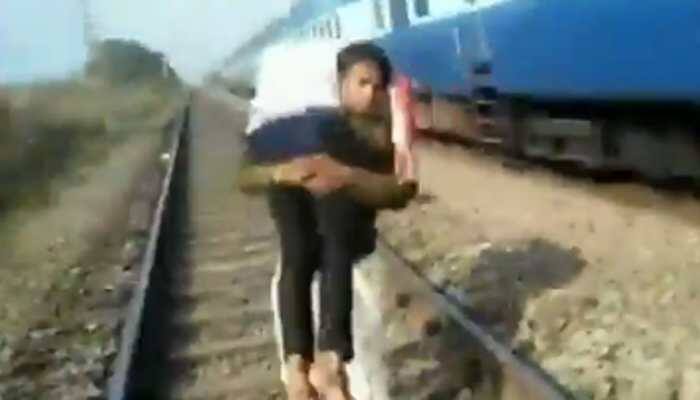 Constable runs at least a kilometre carrying injured man on shoulder, saves life: Watch