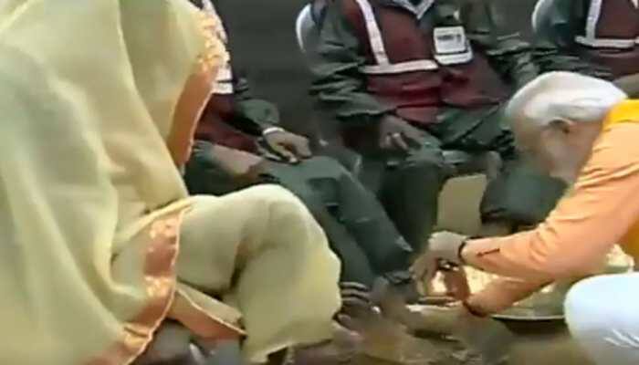 PM Modi honours sanitation workers in Kumbh, washes their feet: Watch