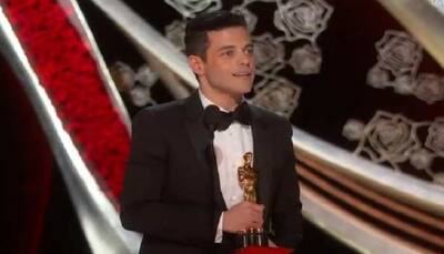 Rami Malek falls off Oscars stage