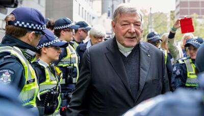 Top Vatican cleric Cardinal Pell found guilty of abusing two choir boys 22 years ago