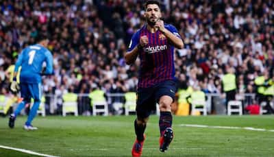 Luis Suarez double helps Barcelona triumph 3-0 against arch-rivals Real Madrid