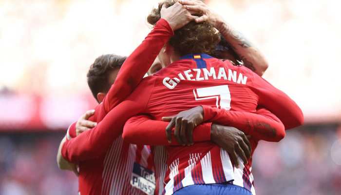 Alvaro Morata&#039;s brace keeps up 10-man Atletico Madrid&#039;s Barca chase