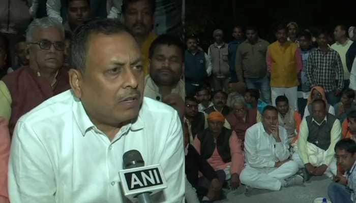 Did not protest against him, says BJP MLA Rakesh Singh Baghel who was thrashed by party MP Sharad Tripathi in UP