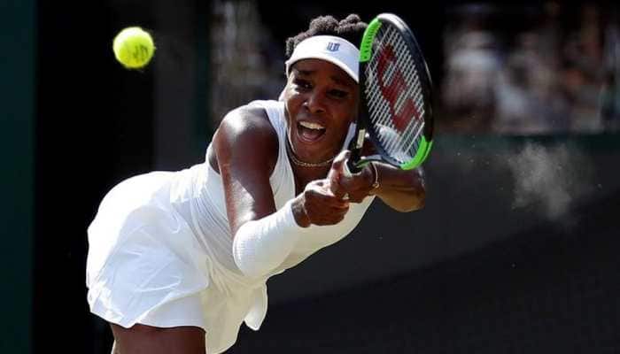 Venus Williams overcomes illness to advance to 2nd round at Indian Wells