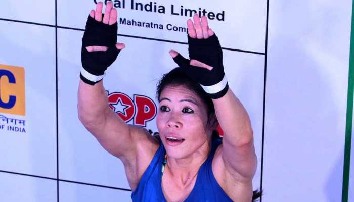 Yearning for Olympic gold, 'Magnificent Mary' keeps punching