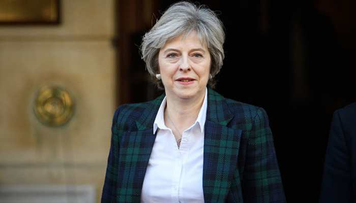 Under pressure, Britain's Theresa May scrambles to win support for Brexit deal